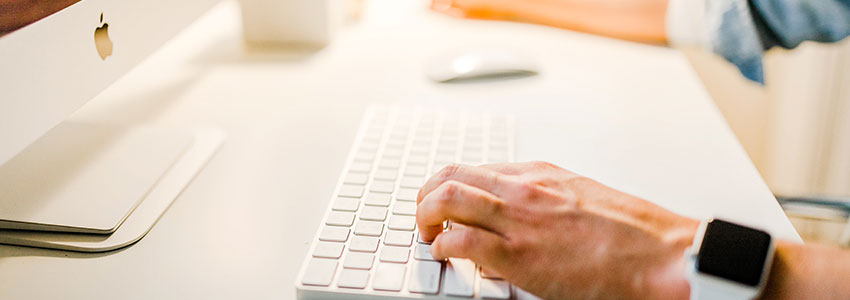 guy using mac computer